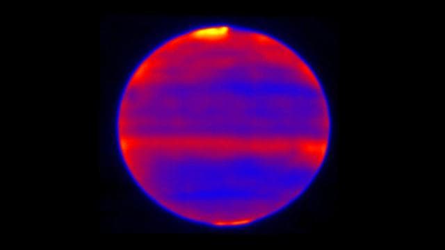 NASA image: Jupiter Poles: Hot from Solar Wind
