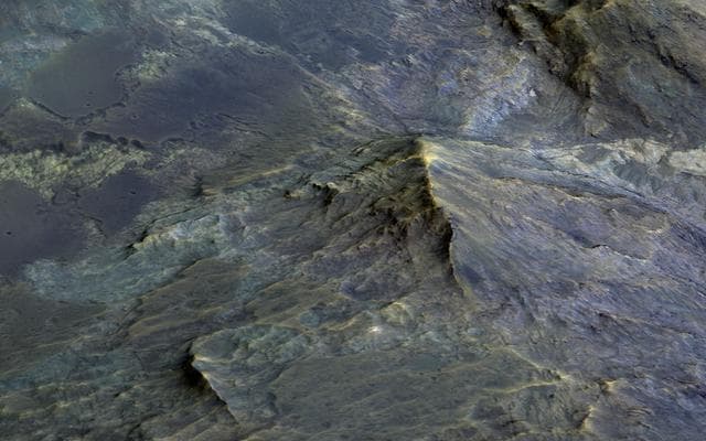 NASA image: Tell-Tale Bedrock in Tyrrhena Terra