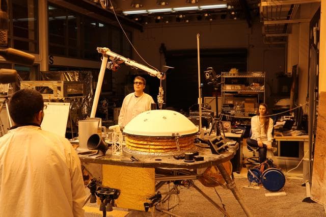 NASA image: InSight Robotic Arm Test Lift of Wind and Thermal Shield