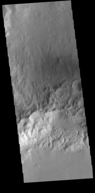 NASA image: A Rim of Two Craters