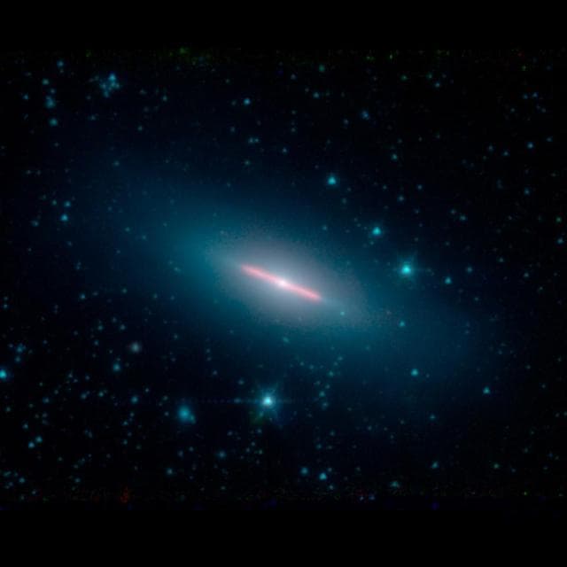 NASA image: NASA's Spitzer Spots a Perfectly Sideways Galaxy