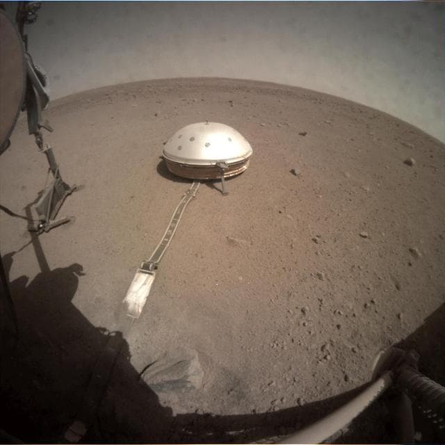 NASA image: Fisheye Camera: InSight Lifts the Mole's Support Structure