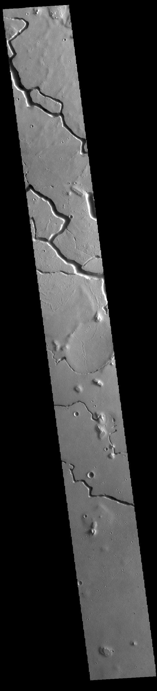 NASA image: Hephaestus Fossae