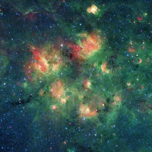 NASA image: Spitzer Spots Bubbles and Bow Shocks