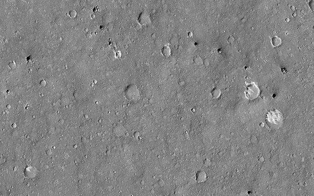 NASA image: Dark Craters