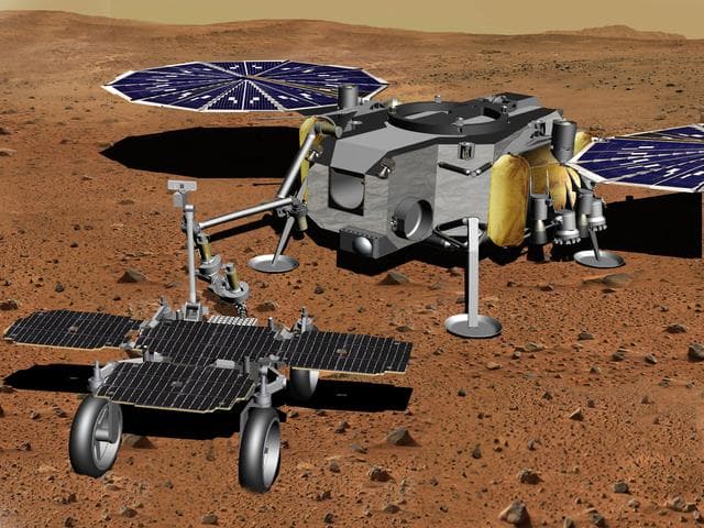 NASA image: Robotic Arm Transferring Tubes From Fetch Rover to Lander (Artist's Concept)