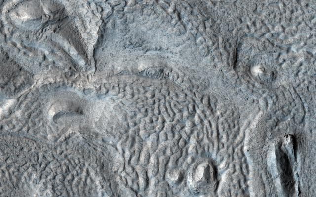 NASA image: Pits, Hollows and Viscous Flow