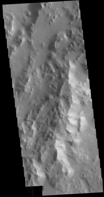 NASA image: Orcus Patera Dark Slope Streaks