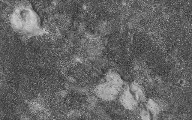 NASA image: Mounds Cut by a Fissure