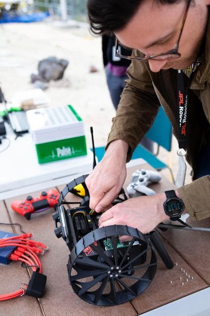 NASA image: NASA Scientist Works on an A-PUFFER Robot During Trials