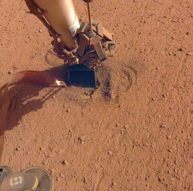 NASA image: InSight's Arm Pulls Back, Revealing the Mole
