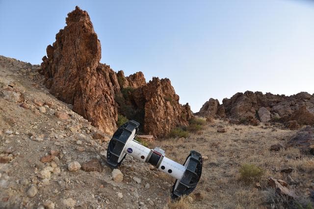 NASA image: The Tethered Axel Autonomously Descends a Rocky Slope