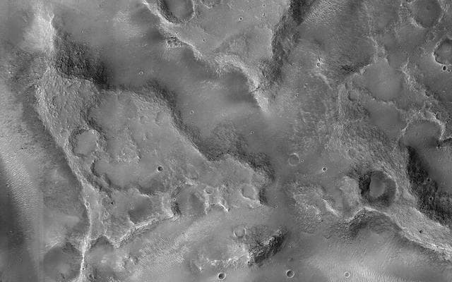 NASA image: Fractured Blocks on a Crater Floor