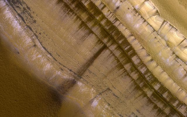 NASA image: Springtime on a Polar Cliff