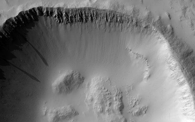 NASA image: Impact Craters as Windows to What Lies Beneath