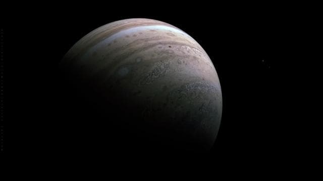NASA image: NASA's Juno Spacecraft Glimpses Jupiter's Moons Io and Europa