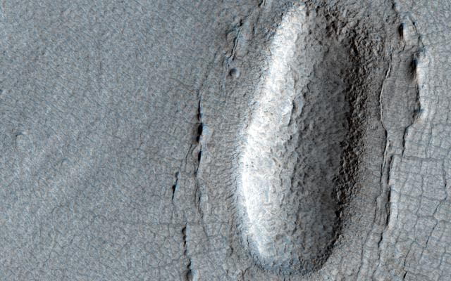 NASA image: Lines of Pits in Protonilus Mensae