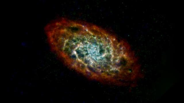 NASA image: Triangulum Galaxy Imaged by Herschel, Planck, IRAS, COBE