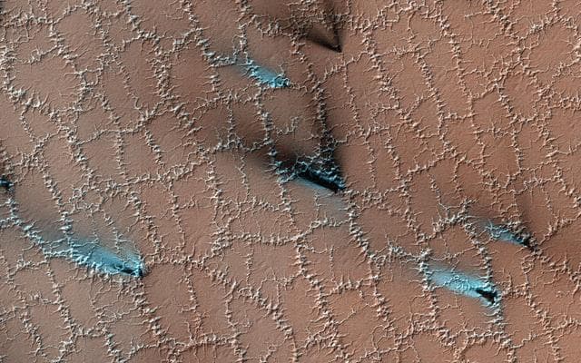 NASA image: Spring Fans and Polygons