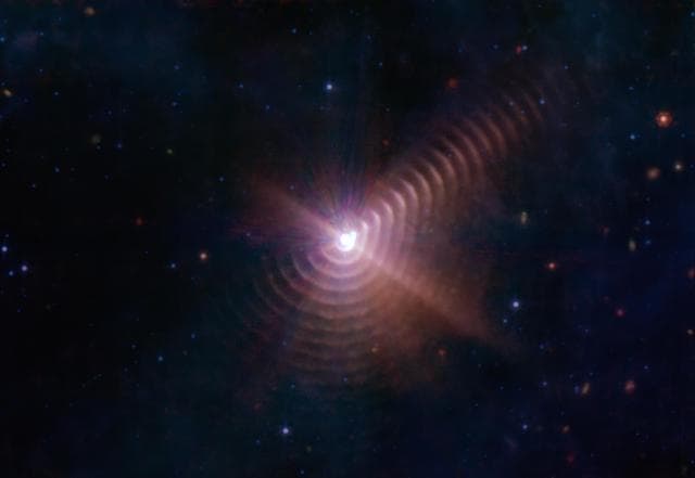 NASA image: Dust Rings in the Wolf-Rayet 140 System