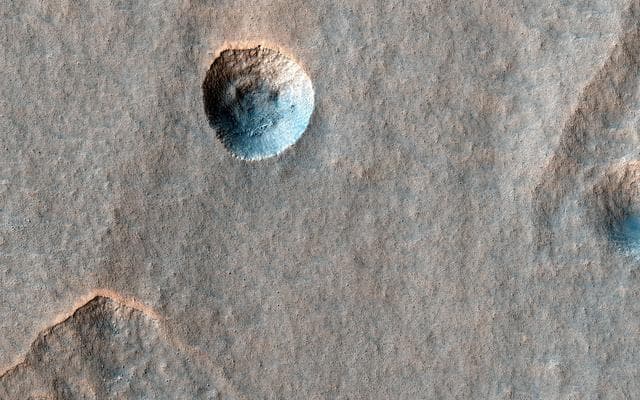 NASA image: A Crater in Scalloped Terrain