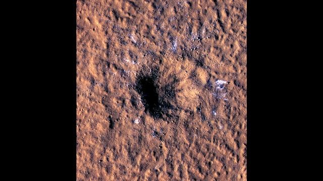 NASA image: HiRISE Views a Mars Impact Crater Surrounded by Water Ice
