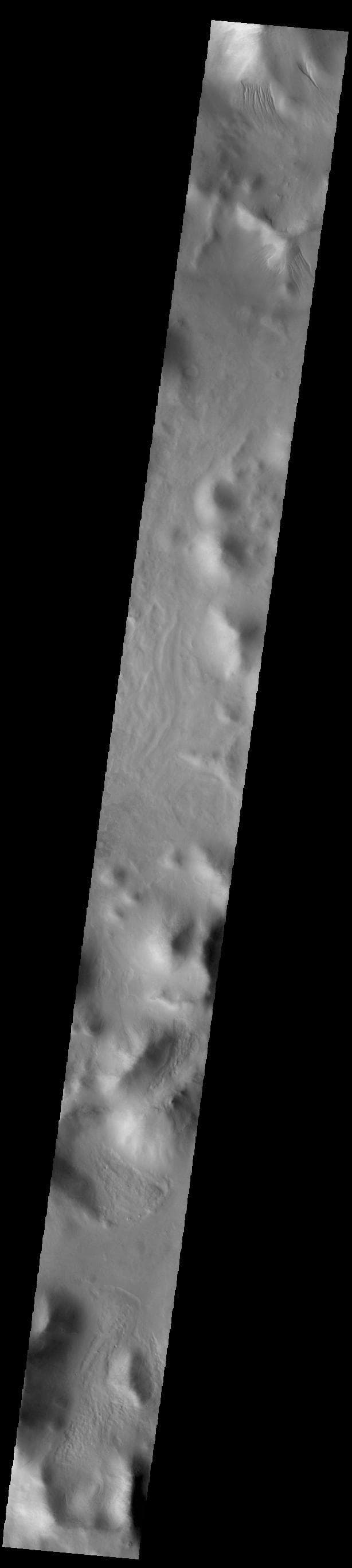 NASA image: Charitum Montes Gullies