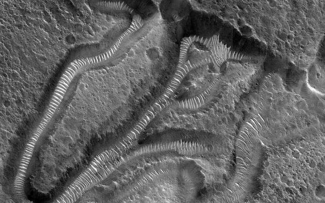 NASA image: Channels on a Streamlined Island of Kasei Vallis