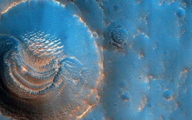 NASA image: Mysterious Crater Deposits