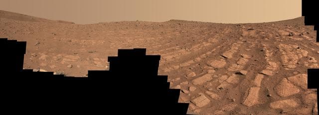 NASA image: Curved Bands of Rocks at 'Skrinkle Haven'