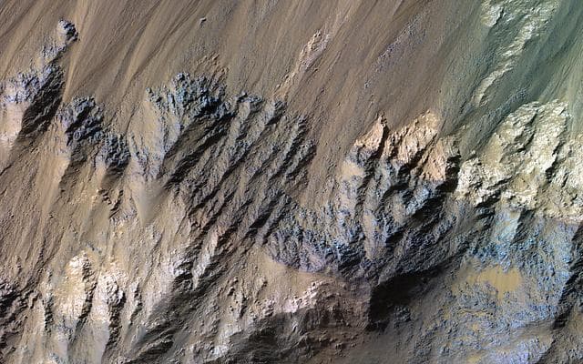 NASA image: Diverse Minerals in Coprates Chasma