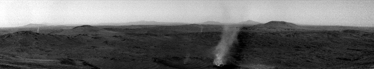 NASA image: Perserverance Captures Crater Rim Dust Devil Eating Its Own
