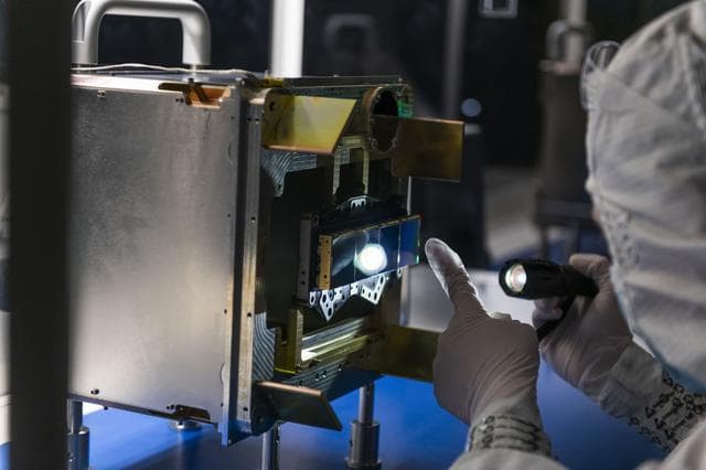 NASA image: An engineer inspects NEO Surveyor’s Infrared Detectors