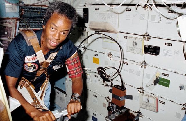 NASA image: Mission Specialist (MS) Bluford exercises on middeck treadmill