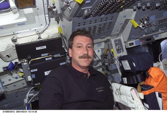 NASA image: Commander Rominger poses on the flight deck of Endeavour