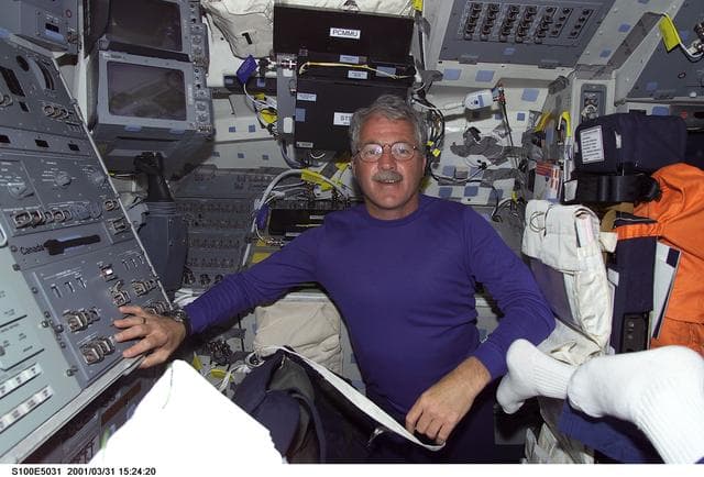 NASA image: MS Phillips poses on the aft flight deck of Endeavour