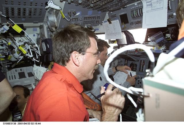 NASA image: Commander Kent Rominger and Pilot Ashby work on the flight deck of Endeavour
