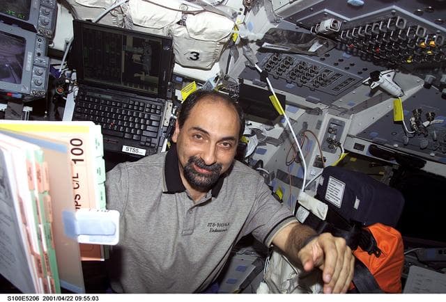 NASA image: MS Guidoni works on the flight deck of Endeavour