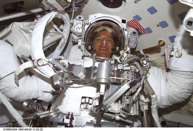 NASA image: MS Parazynski stands ready for the first EVA of STS-100 in the airlock of Endeavour