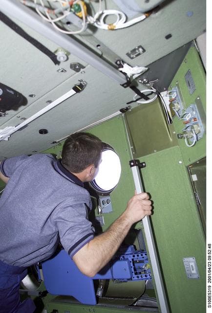 NASA image: MS Lonchakov looks through the nadir window on Zvezda