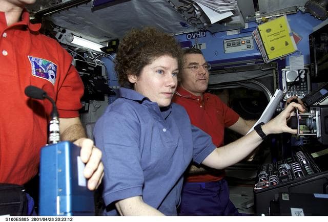 NASA image: Hadfield, Helms and Voss work on the SSRMS controls in Destiny