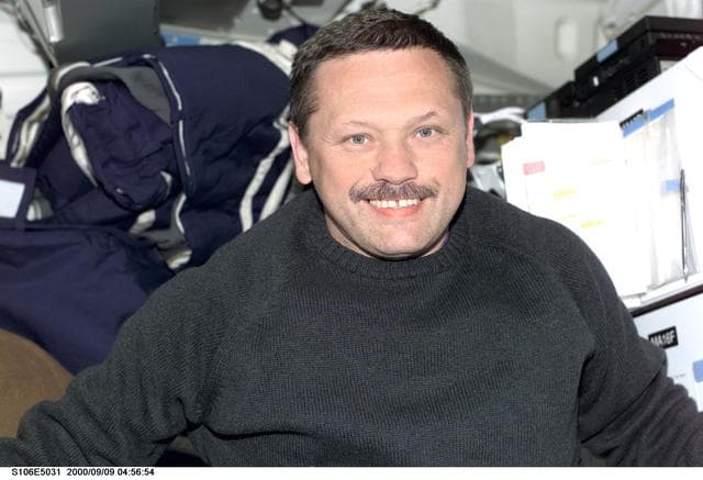 NASA image: MS Morukov poses for a photo aboard Atlantis during STS-106