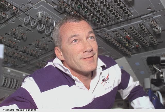 NASA image: Commander Wilcutt at work on Atlantis during STS-106