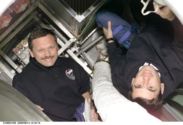 NASA image: MS Morukov and MS Malenchenko working in Progress during STS-106