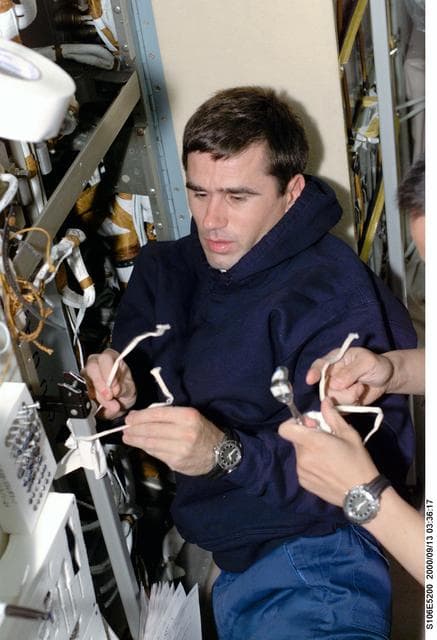NASA image: MS Malenchenko conducts electrical work in Zvezda during STS-106
