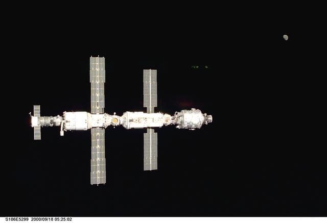 NASA image: View of the ISS as Atlantis makes its closing fly around during STS-106