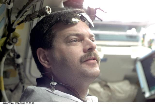 NASA image: Pilot Altman occupies the aft crew workstation during ISS undocking