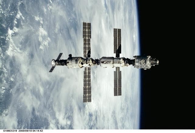 NASA image: View of the ISS as Atlantis makes its closing fly around during STS-106