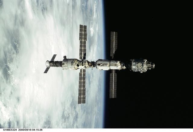 NASA image: View of the ISS as Atlantis makes its closing fly around during STS-106