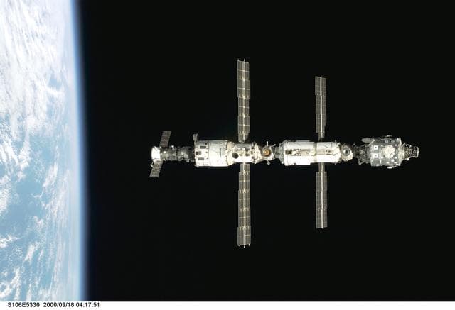 NASA image: View of the ISS as Atlantis makes its closing fly around during STS-106